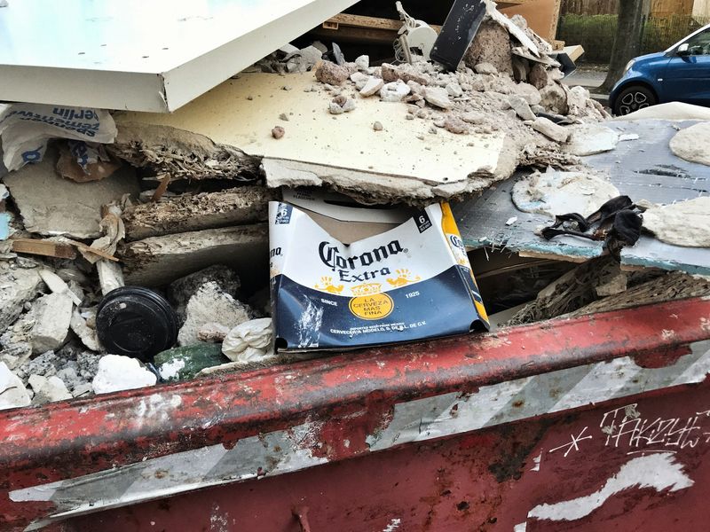 An enclosed skip holding mixed waste